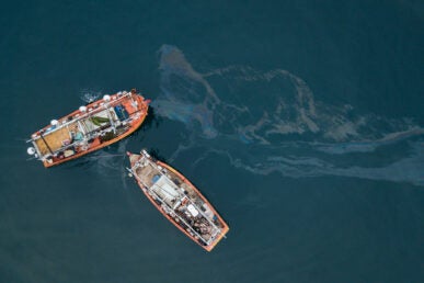 Fishing boats and oil spill