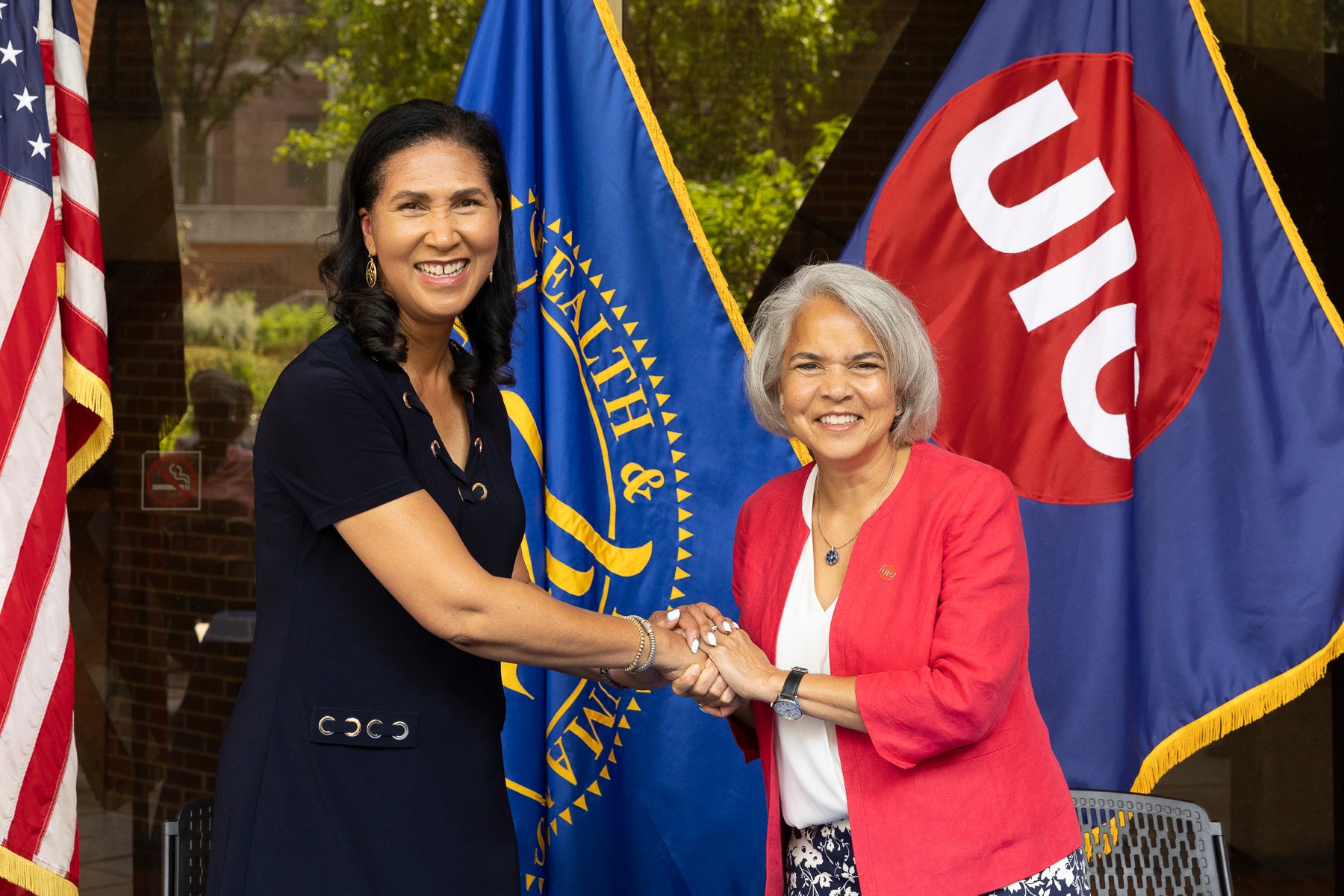 Cheryl Campbell, assistant secretary for administration from the U.S. Department of Health and Human Services, and UIC Chancellor Marie Lynn Miranda signed a memorandum of understanding July 30. (Photo: Jenny Fontaine/University of Illinois Chicago)