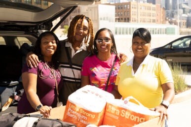 Left to right: Chrystal Tillman, Quentin Wilson, Latoya Oliver and Renee Aiken traveled to help get Quentin settled in. (Photo: Jenny Fontaine/UIC)