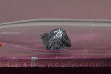 A crystal of arsenic in a glass tube.