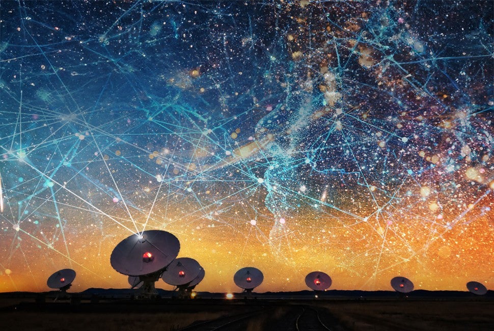 A row of satellite dishes pointed up at an orange and blue sky filled with stars, galaxies and straight lines.